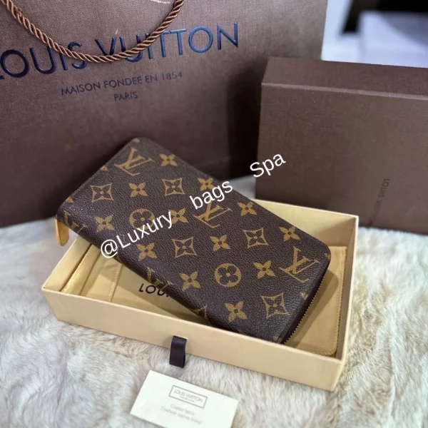 ร้านขายกระเป๋าแบรนด์เนมมือสอง กระเป๋าแบรนด์เนมมือสอง กระเป๋า Louis Vuitton Zippy Long Wallet dc13 มือสอง